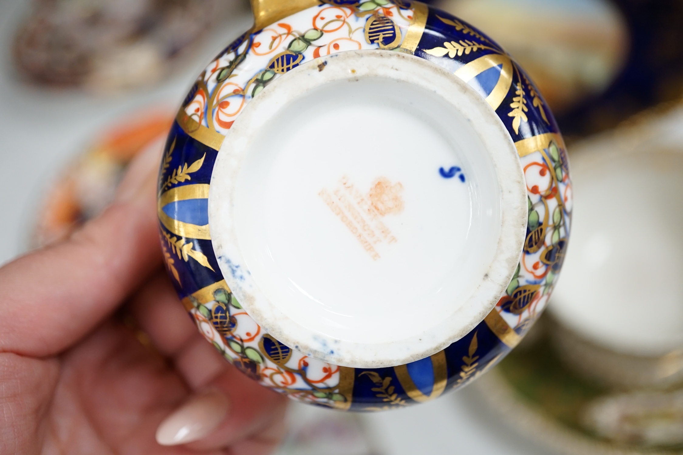 A collection of 19th century and later porcelain to include Aynsley, Davenport, Royal Crown Derby and Spode, some Imari pattern, largest 23cm in diameter. Condition - varies, mostly fair